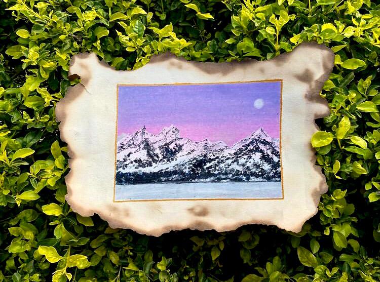 Oil Pastel Drawing on Burnt Paper: Hues of Violet Sky and Mountainous Landscape