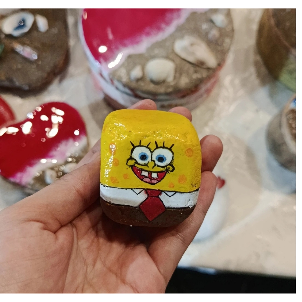 Sponge bob paper weight, plant decorator.