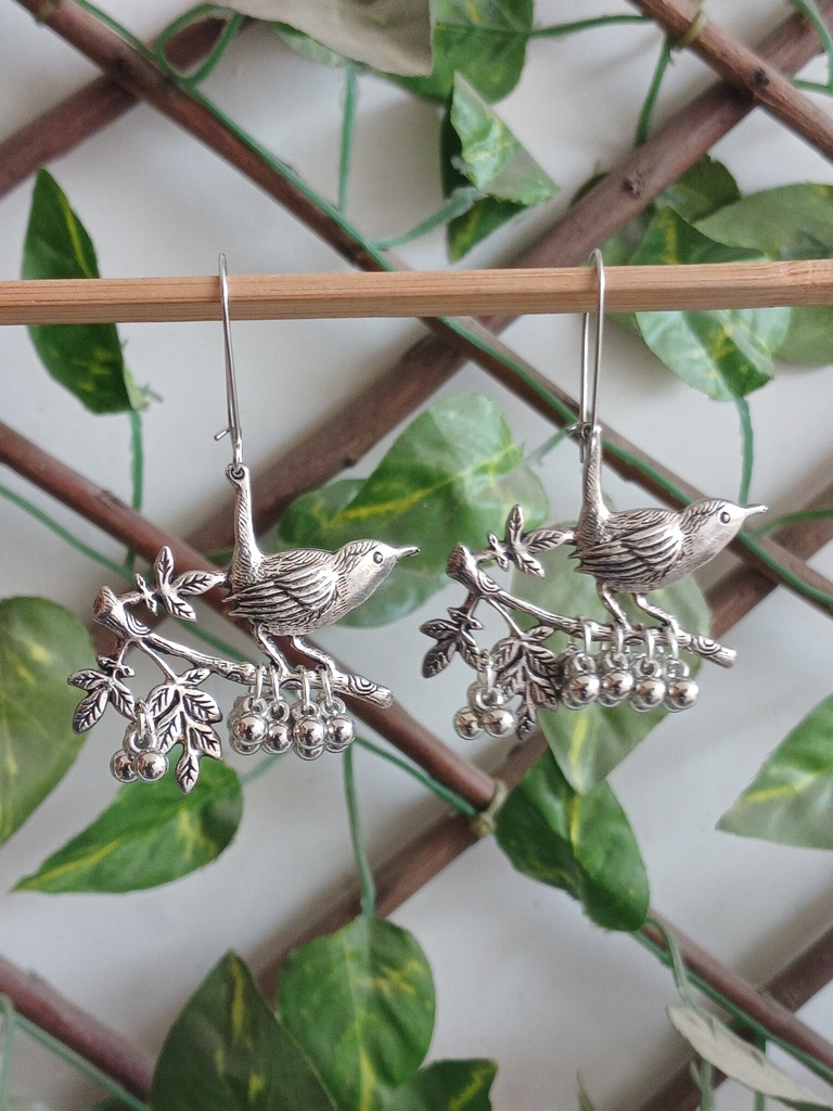 Bird charm earrings