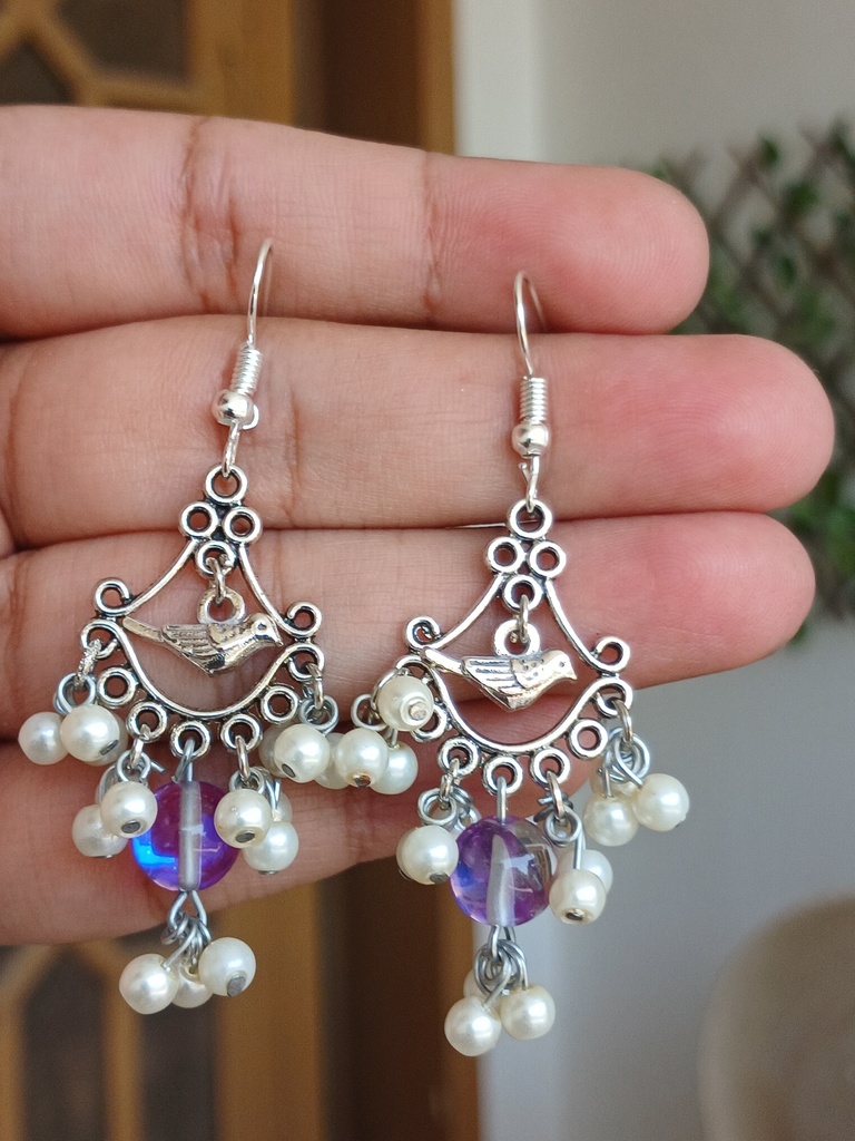 Bird charm earrings