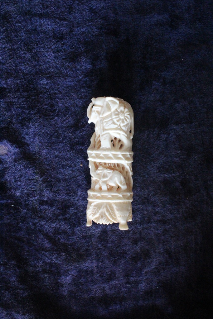 hand carved Camel bone sculpture