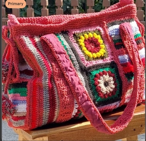 Hand knitted crochet bag.