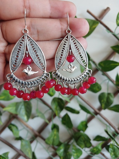 Bird charm earrings