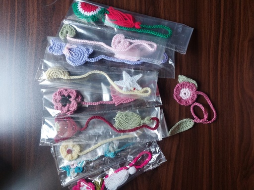 Hand made charms ,book marks and key chains.