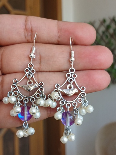 Bird charm earrings
